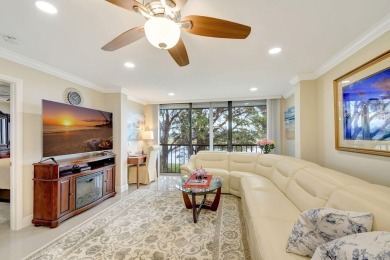 Enjoy a full lake view from extended living area in this 2/2 on Fountains Golf and Country Club in Florida - for sale on GolfHomes.com, golf home, golf lot