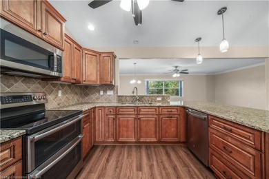 Discover your perfect oasis in the highly sought-after Harder on Harder Hall Exec Golf Course in Florida - for sale on GolfHomes.com, golf home, golf lot