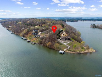This exceptional lake lot provides 220 feet of shoreline on the on Goose Pond Colony Resort - Lake Golf Course in Alabama - for sale on GolfHomes.com, golf home, golf lot