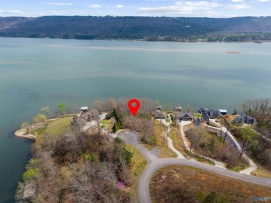 This exceptional lake lot provides 220 feet of shoreline on the on Goose Pond Colony Resort - Lake Golf Course in Alabama - for sale on GolfHomes.com, golf home, golf lot