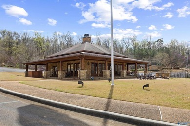 This exceptional lake lot provides 220 feet of shoreline on the on Goose Pond Colony Resort - Lake Golf Course in Alabama - for sale on GolfHomes.com, golf home, golf lot