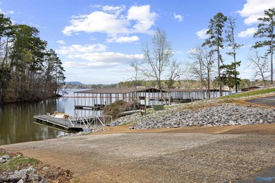 This exceptional lake lot provides 220 feet of shoreline on the on Goose Pond Colony Resort - Lake Golf Course in Alabama - for sale on GolfHomes.com, golf home, golf lot