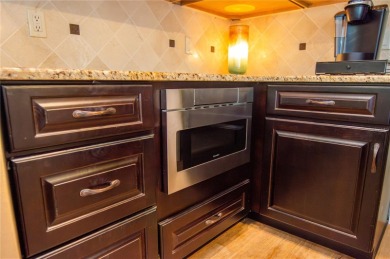 GORGEOUS 3 BEDROOM - 2 BATH - 2 CAR GARAGE POOL HOME AT THE on Tarpon Woods Golf Club in Florida - for sale on GolfHomes.com, golf home, golf lot
