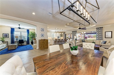 Under contract-accepting backup offers. Experience resort-style on Esplanade Golf and Country at Lakewood Ranch in Florida - for sale on GolfHomes.com, golf home, golf lot