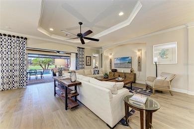 Under contract-accepting backup offers. Experience resort-style on Esplanade Golf and Country at Lakewood Ranch in Florida - for sale on GolfHomes.com, golf home, golf lot