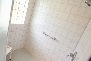 GORGEOUS 3 BEDROOM - 2 BATH - 2 CAR GARAGE POOL HOME AT THE on Tarpon Woods Golf Club in Florida - for sale on GolfHomes.com, golf home, golf lot