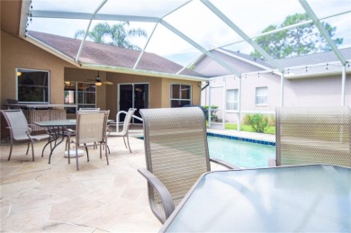 GORGEOUS 3 BEDROOM - 2 BATH - 2 CAR GARAGE POOL HOME AT THE on Tarpon Woods Golf Club in Florida - for sale on GolfHomes.com, golf home, golf lot