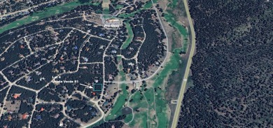 Discover your dream homesite with this beautiful 1/2 acre treed on Angel Fire Resort Country Club in New Mexico - for sale on GolfHomes.com, golf home, golf lot