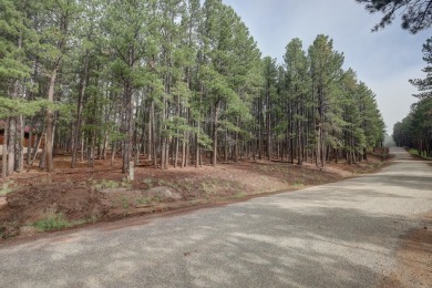 Discover your dream homesite with this beautiful 1/2 acre treed on Angel Fire Resort Country Club in New Mexico - for sale on GolfHomes.com, golf home, golf lot