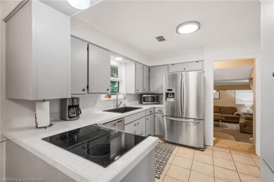 Welcome to this stunning tri-level home featuring four spacious on Vache-Grasse Country Club in Arkansas - for sale on GolfHomes.com, golf home, golf lot