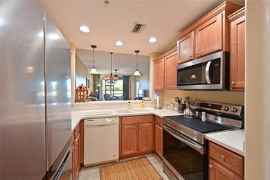 Enjoy breathtaking views the moment you walk through the door on Stoneybrook Golf Club At Heritage Harbour in Florida - for sale on GolfHomes.com, golf home, golf lot