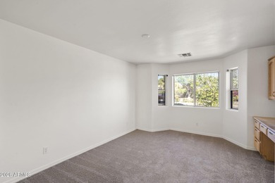 Welcome home to this beautifully updated 2-bedroom, 2-bath home on Fountain of the Sun Country Club in Arizona - for sale on GolfHomes.com, golf home, golf lot