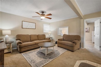 Welcome to this stunning tri-level home featuring four spacious on Vache-Grasse Country Club in Arkansas - for sale on GolfHomes.com, golf home, golf lot