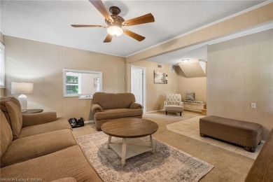 Welcome to this stunning tri-level home featuring four spacious on Vache-Grasse Country Club in Arkansas - for sale on GolfHomes.com, golf home, golf lot