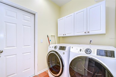 This immaculate, move-in-ready Arvida Laurel model is located on on River Hills Country Club in Florida - for sale on GolfHomes.com, golf home, golf lot