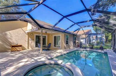 This immaculate, move-in-ready Arvida Laurel model is located on on River Hills Country Club in Florida - for sale on GolfHomes.com, golf home, golf lot