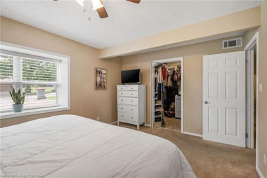 Welcome to this stunning tri-level home featuring four spacious on Vache-Grasse Country Club in Arkansas - for sale on GolfHomes.com, golf home, golf lot