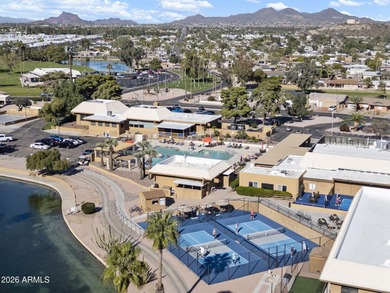 Welcome home to this beautifully updated 2-bedroom, 2-bath home on Fountain of the Sun Country Club in Arizona - for sale on GolfHomes.com, golf home, golf lot