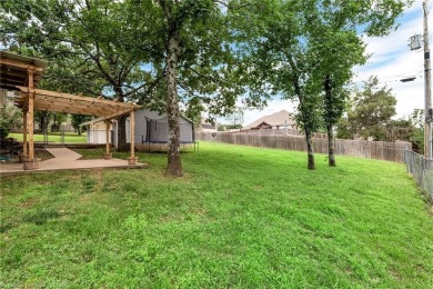 Welcome to this stunning tri-level home featuring four spacious on Vache-Grasse Country Club in Arkansas - for sale on GolfHomes.com, golf home, golf lot