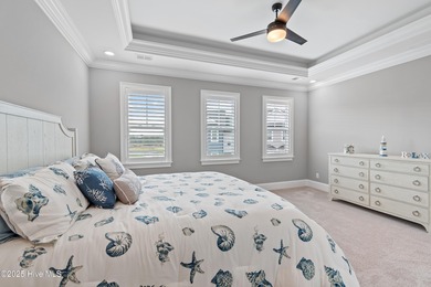 Welcome to easy living in this luxurious Eastwood Bluffs on Sea Trail Golf Resort in North Carolina - for sale on GolfHomes.com, golf home, golf lot