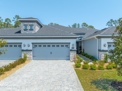 This exclusive four-bedroom townhome in the gated Plantation Bay on Plantation Bay Golf and Country Club in Florida - for sale on GolfHomes.com, golf home, golf lot