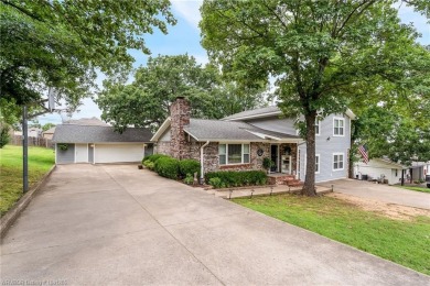 Welcome to this stunning tri-level home featuring four spacious on Vache-Grasse Country Club in Arkansas - for sale on GolfHomes.com, golf home, golf lot