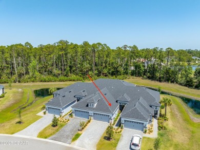 This exclusive four-bedroom townhome in the gated Plantation Bay on Plantation Bay Golf and Country Club in Florida - for sale on GolfHomes.com, golf home, golf lot