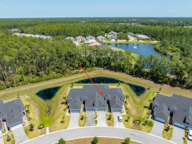 This exclusive four-bedroom townhome in the gated Plantation Bay on Plantation Bay Golf and Country Club in Florida - for sale on GolfHomes.com, golf home, golf lot