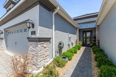 This exclusive four-bedroom townhome in the gated Plantation Bay on Plantation Bay Golf and Country Club in Florida - for sale on GolfHomes.com, golf home, golf lot