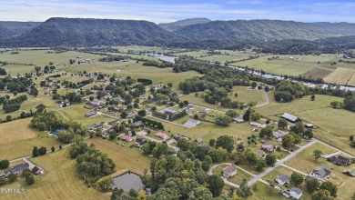 This beautifully maintained home with a gorgeous in ground pool on Silver Lake Golf Course in Tennessee - for sale on GolfHomes.com, golf home, golf lot