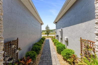 This exclusive four-bedroom townhome in the gated Plantation Bay on Plantation Bay Golf and Country Club in Florida - for sale on GolfHomes.com, golf home, golf lot
