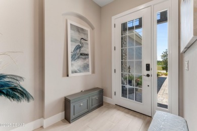 This exclusive four-bedroom townhome in the gated Plantation Bay on Plantation Bay Golf and Country Club in Florida - for sale on GolfHomes.com, golf home, golf lot