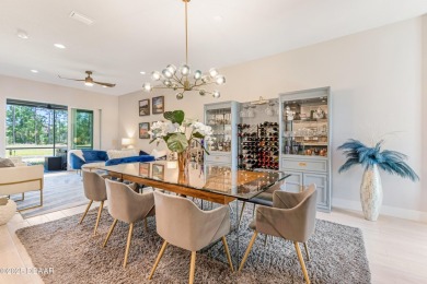 This exclusive four-bedroom townhome in the gated Plantation Bay on Plantation Bay Golf and Country Club in Florida - for sale on GolfHomes.com, golf home, golf lot