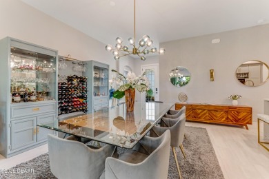 This exclusive four-bedroom townhome in the gated Plantation Bay on Plantation Bay Golf and Country Club in Florida - for sale on GolfHomes.com, golf home, golf lot