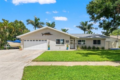 Welcome to 5523 18th St. NE, where elevated living meets on Mangrove Bay Golf Course in Florida - for sale on GolfHomes.com, golf home, golf lot