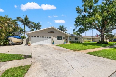 Welcome to 5523 18th St. NE, where elevated living meets on Mangrove Bay Golf Course in Florida - for sale on GolfHomes.com, golf home, golf lot