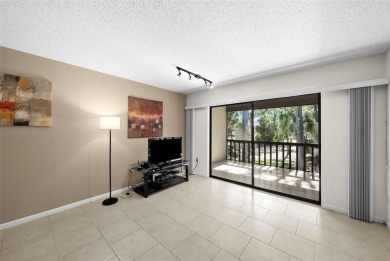 Nestled within the lush, park-like setting of The Meadows in on The Meadows Golf and Country Club in Florida - for sale on GolfHomes.com, golf home, golf lot