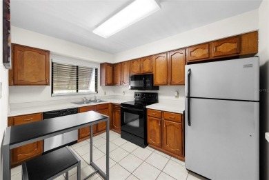 Nestled within the lush, park-like setting of The Meadows in on The Meadows Golf and Country Club in Florida - for sale on GolfHomes.com, golf home, golf lot