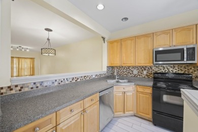 Charming  2-story townhome located in Little Suwanee Pointe on Collins Hill Golf Club in Georgia - for sale on GolfHomes.com, golf home, golf lot