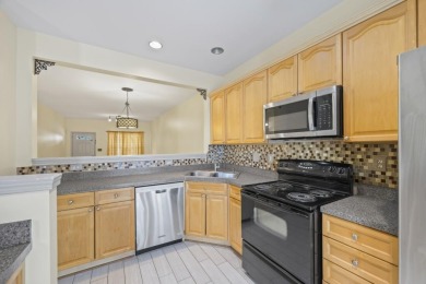 Charming  2-story townhome located in Little Suwanee Pointe on Collins Hill Golf Club in Georgia - for sale on GolfHomes.com, golf home, golf lot