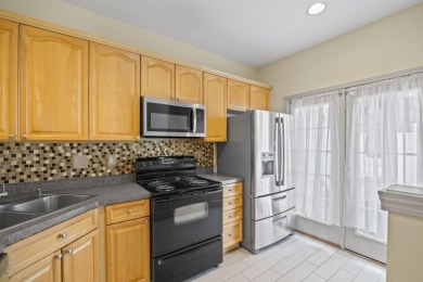 Charming  2-story townhome located in Little Suwanee Pointe on Collins Hill Golf Club in Georgia - for sale on GolfHomes.com, golf home, golf lot