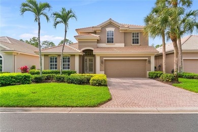 Sun-drenched southern exposure, a stunning updated pool, and on Shadow Wood Country Club in Florida - for sale on GolfHomes.com, golf home, golf lot