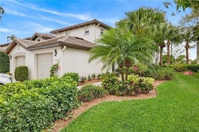 Tastefully updated first floor coach home is now available in on Pelican Sound Golf and River Club in Florida - for sale on GolfHomes.com, golf home, golf lot