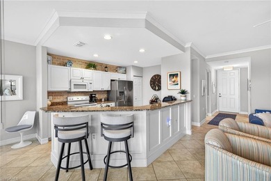 Tastefully updated first floor coach home is now available in on Pelican Sound Golf and River Club in Florida - for sale on GolfHomes.com, golf home, golf lot