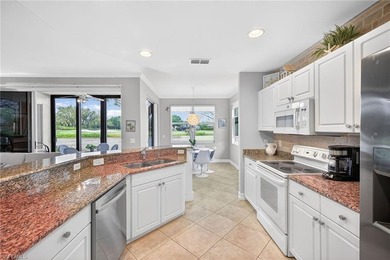 Tastefully updated first floor coach home is now available in on Pelican Sound Golf and River Club in Florida - for sale on GolfHomes.com, golf home, golf lot