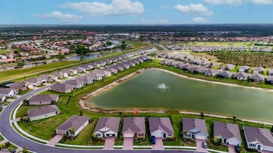 Perfectly positioned to capture tranquil LAKE and FOUNTAIN VIEWS on Herons Glen Golf and Country Club in Florida - for sale on GolfHomes.com, golf home, golf lot