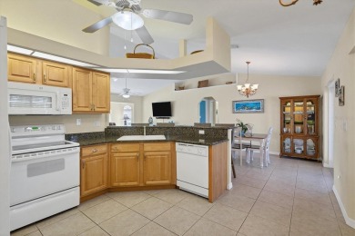 A GOLFER'S DREAM HOME! This updated pool home in Rotonda West on Rotonda Golf and Country Club - Long Marsh  in Florida - for sale on GolfHomes.com, golf home, golf lot