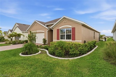Perfectly positioned to capture tranquil LAKE and FOUNTAIN VIEWS on Herons Glen Golf and Country Club in Florida - for sale on GolfHomes.com, golf home, golf lot