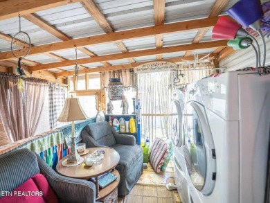 This charming property offers a newer washer and dryer, a on Lake Tansi Village Country Club in Tennessee - for sale on GolfHomes.com, golf home, golf lot