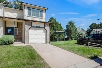 Experience the charm of this delightful end-unit townhome in the on Valley Hi Golf Course in Colorado - for sale on GolfHomes.com, golf home, golf lot